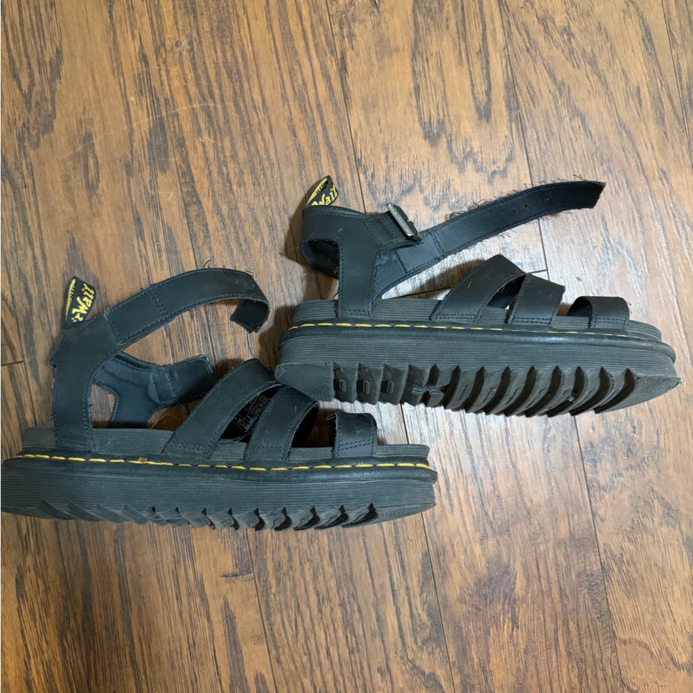 Women’s Dr.Martens platform sandals in black.